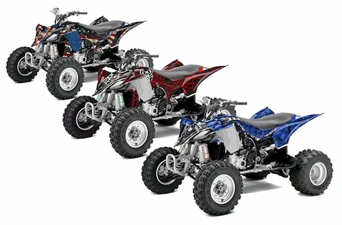 Yamaha YFZ 450R quads shown in three custom graphic kit looks