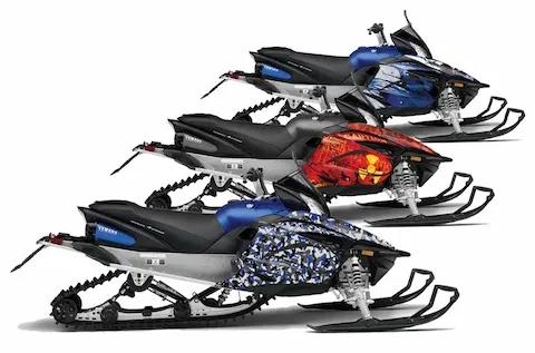 Yamaha Apex sleds shown in three custom graphic kit looks